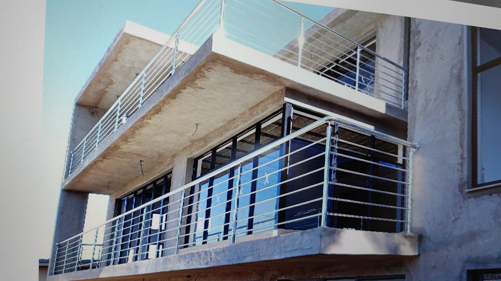 Commercial facade rail